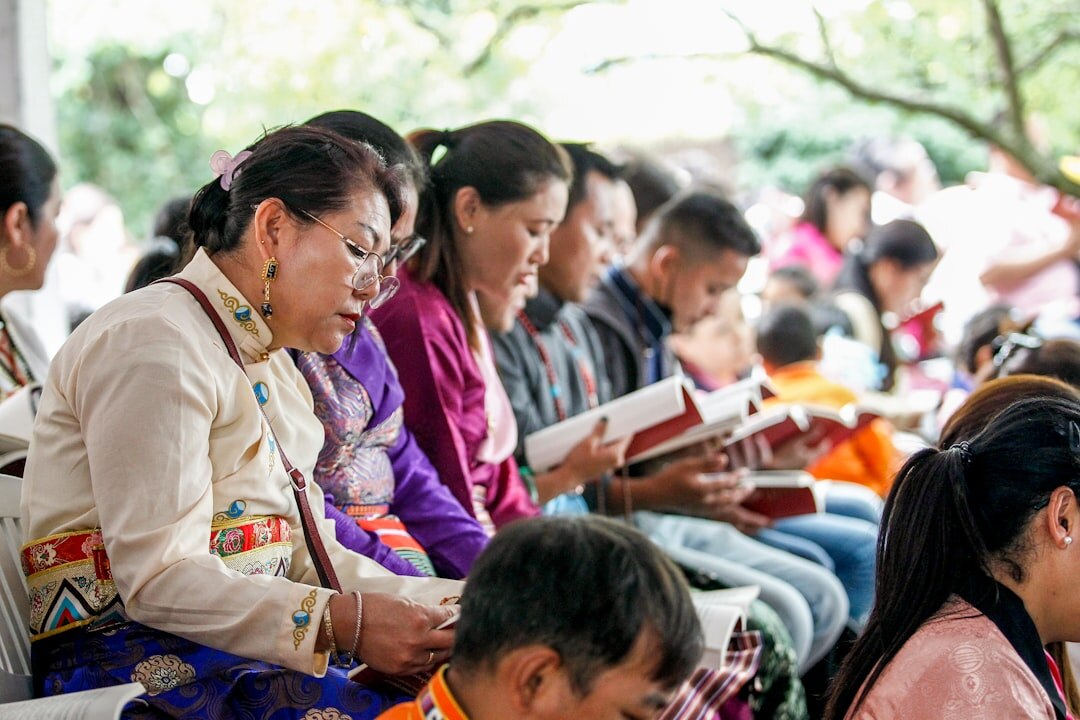 Volunteers at a community storytelling workshop taking notes